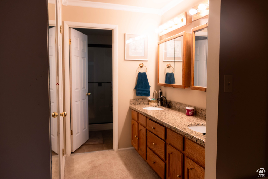 Bathroom featuring double vanity