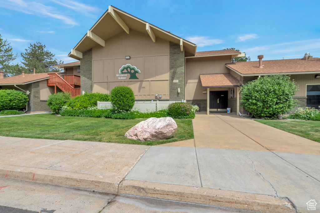 View of front of home with a front lawn