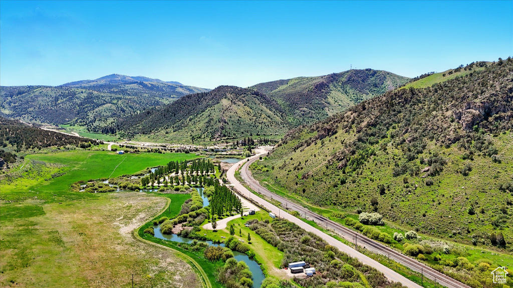 View of mountain background featuring a nearby body of water