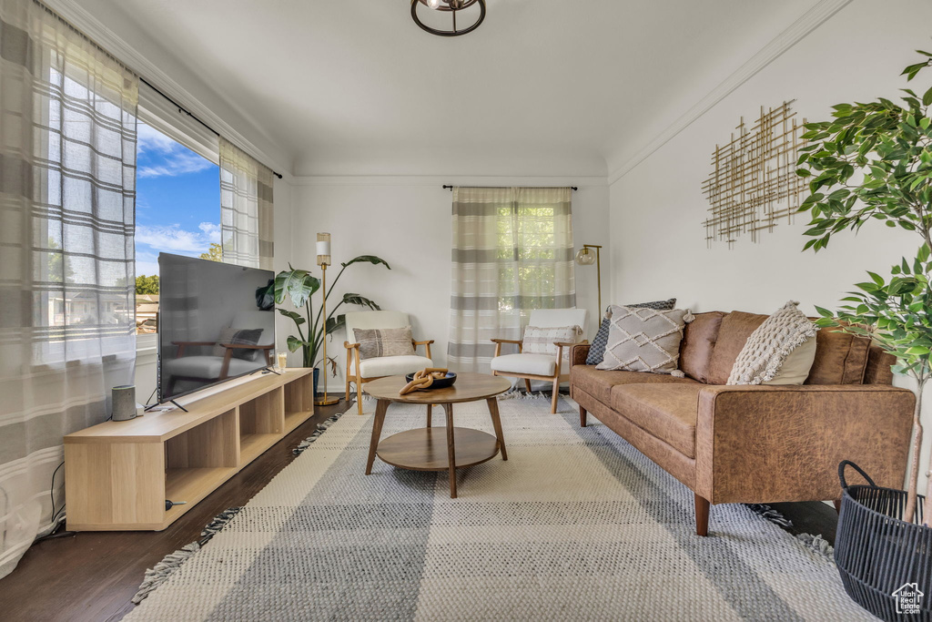 Living area featuring plenty of natural light and wood finished floors