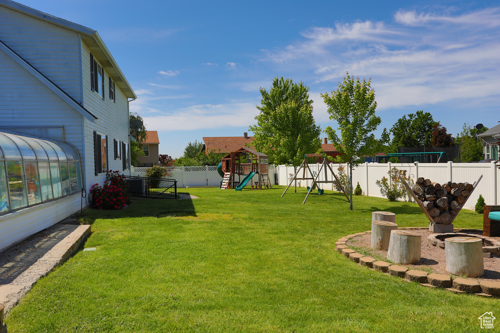 View of yard featuring a playground