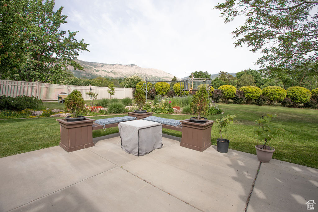 View of patio featuring a mountain view