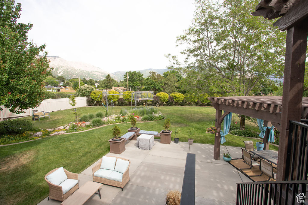 View of patio with a mountain view