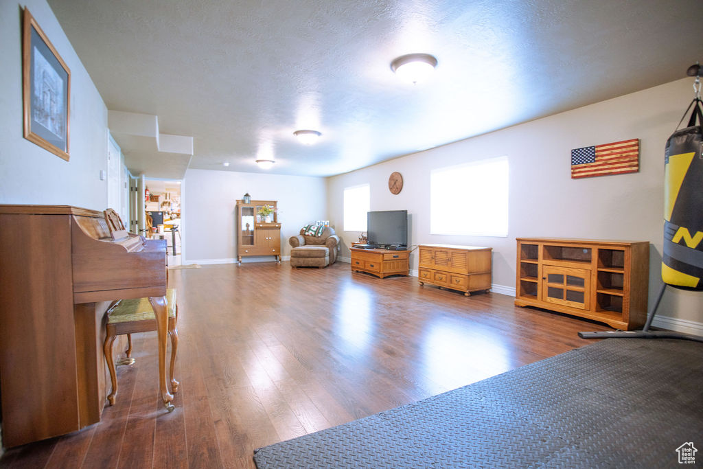 Misc room featuring wood finished floors and baseboards