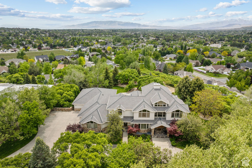 View from above of property with a mountainous background