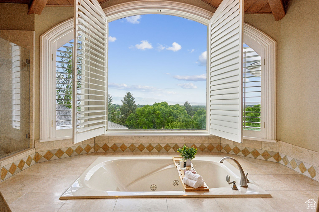 Full bath with a whirlpool tub