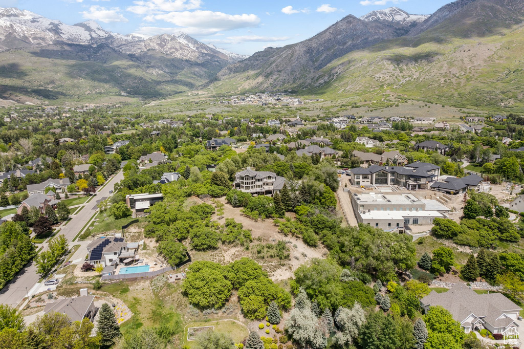 Aerial view of residential area with a mountainous background