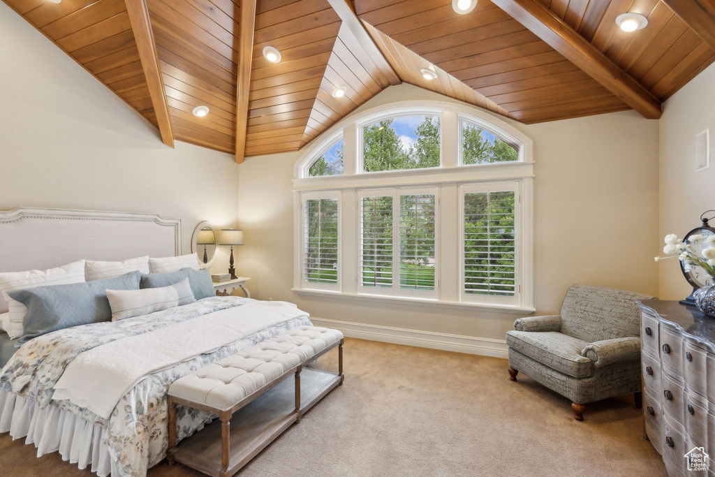 Carpeted bedroom featuring wooden ceiling, baseboards, and recessed lighting