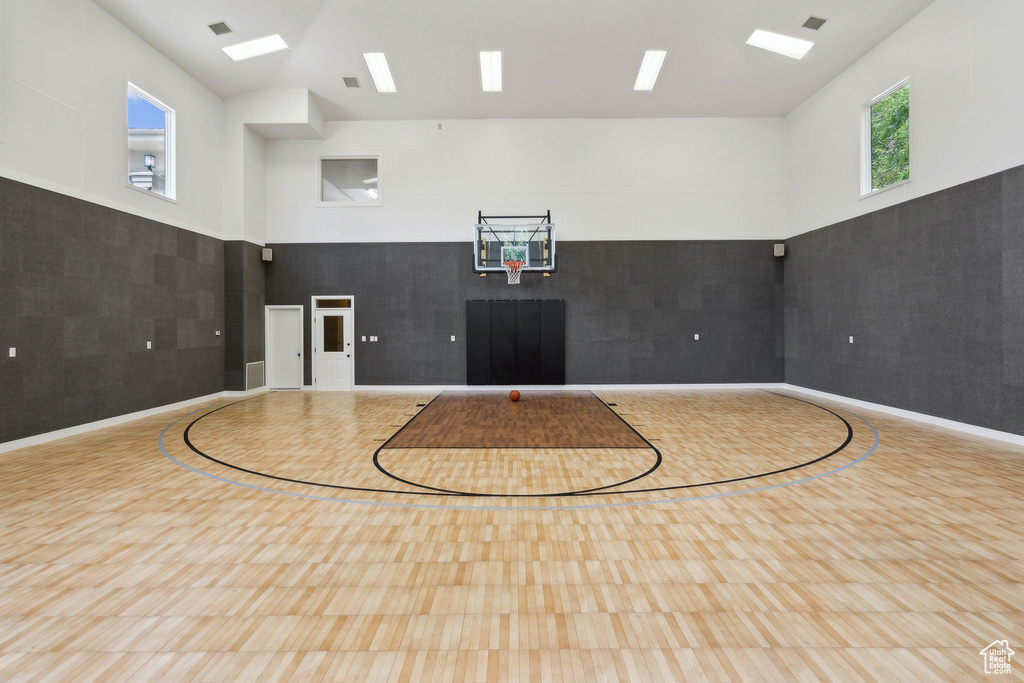View of sport court featuring community basketball court and healthy amount of natural light