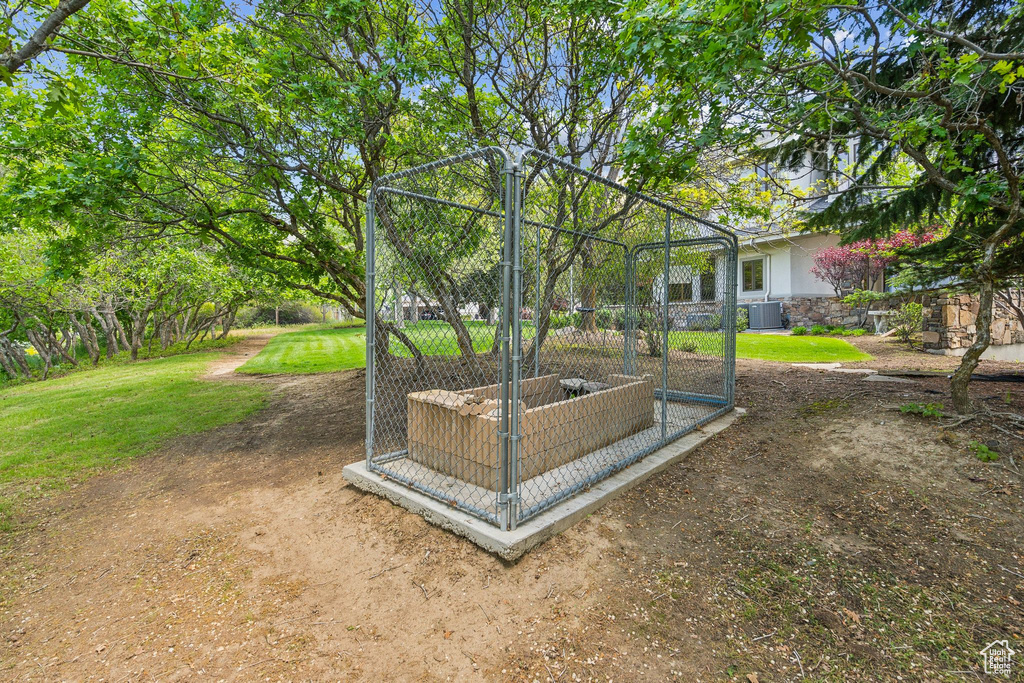 View of yard with central AC