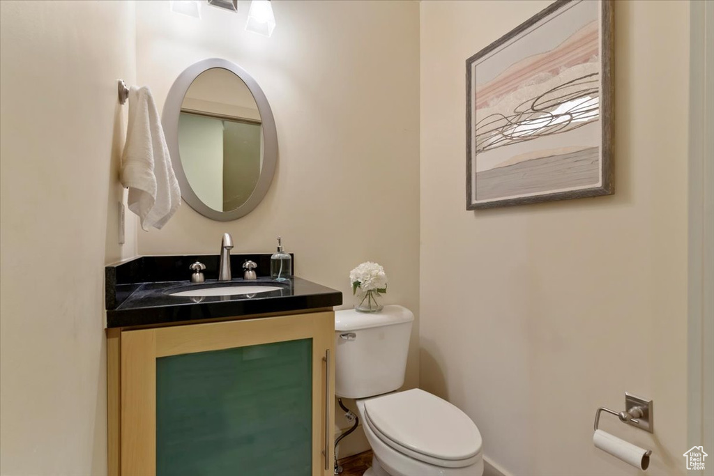 Bathroom with toilet and vanity