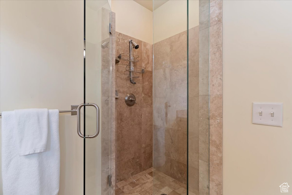 Full bath with a shower stall