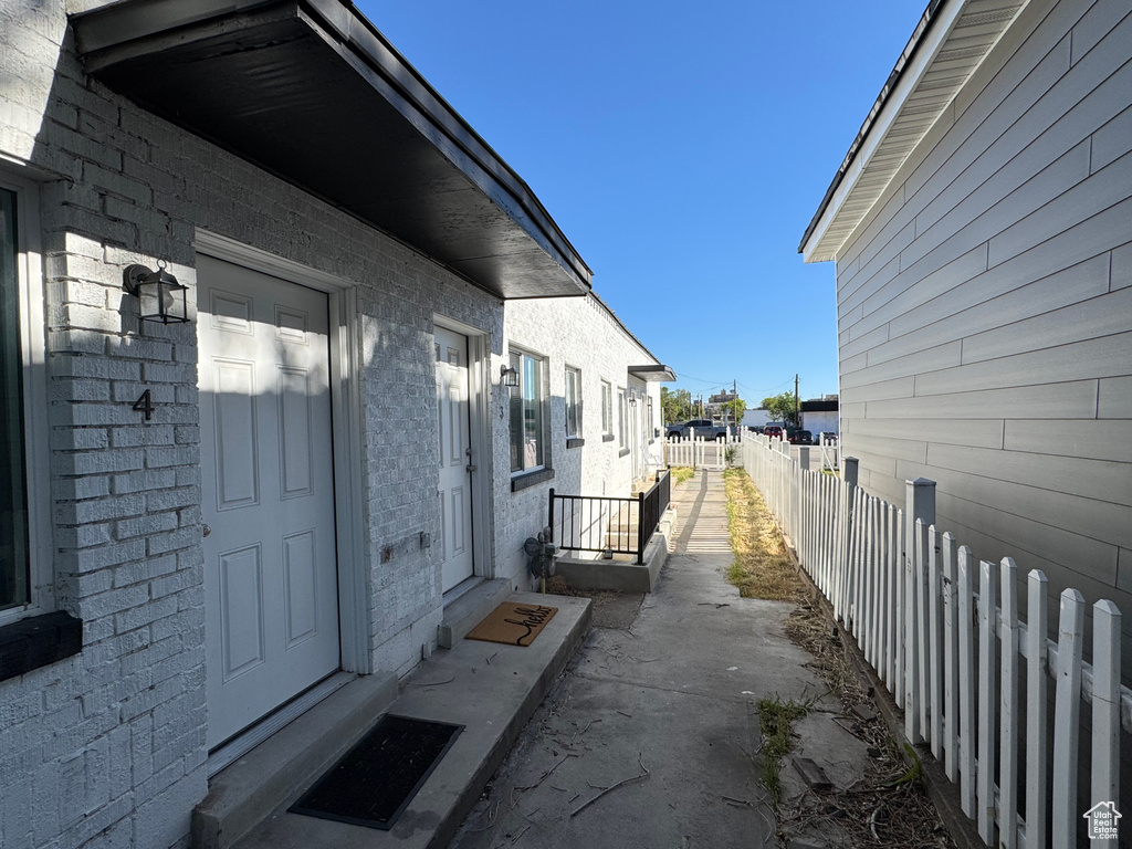 View of property exterior featuring brick siding
