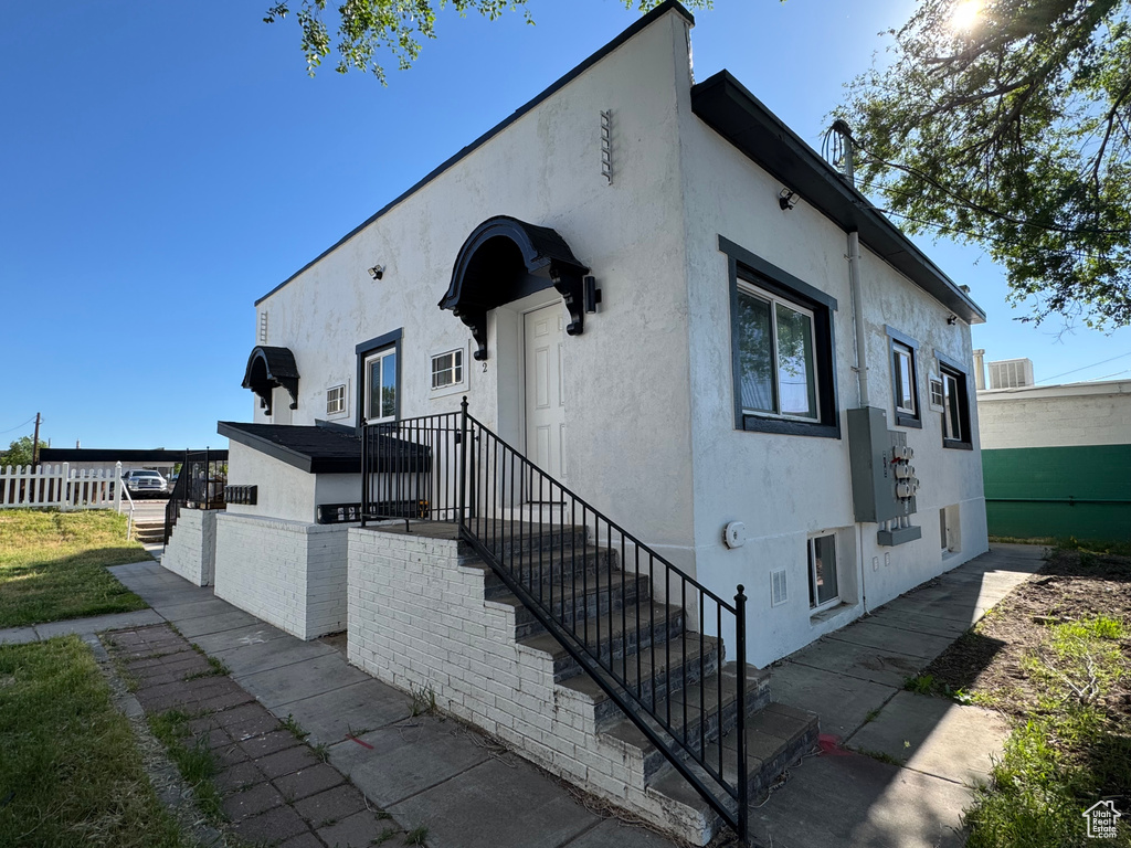 View of front of property with stucco siding