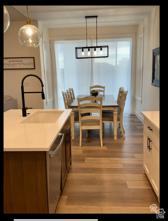Dining space featuring light wood-type flooring