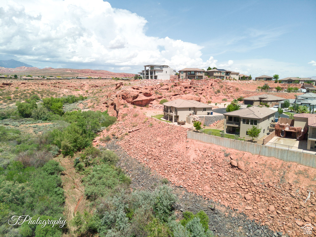 View of yard featuring a residential view and a mountain view