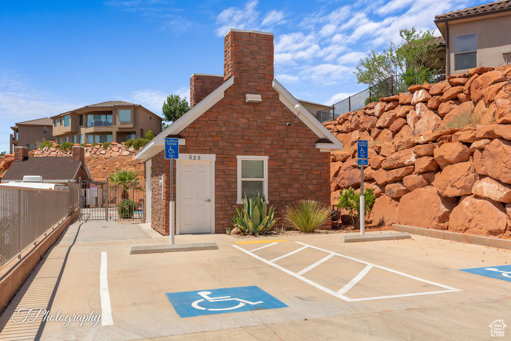 Uncovered parking lot featuring a gate