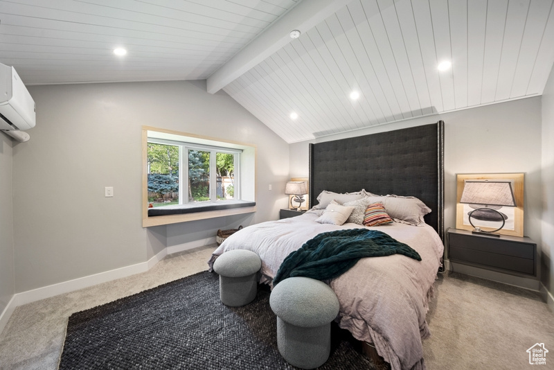 Bedroom with light carpet, baseboards, recessed lighting, and a wall mounted AC