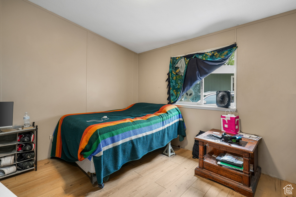Bedroom featuring wood finished floors