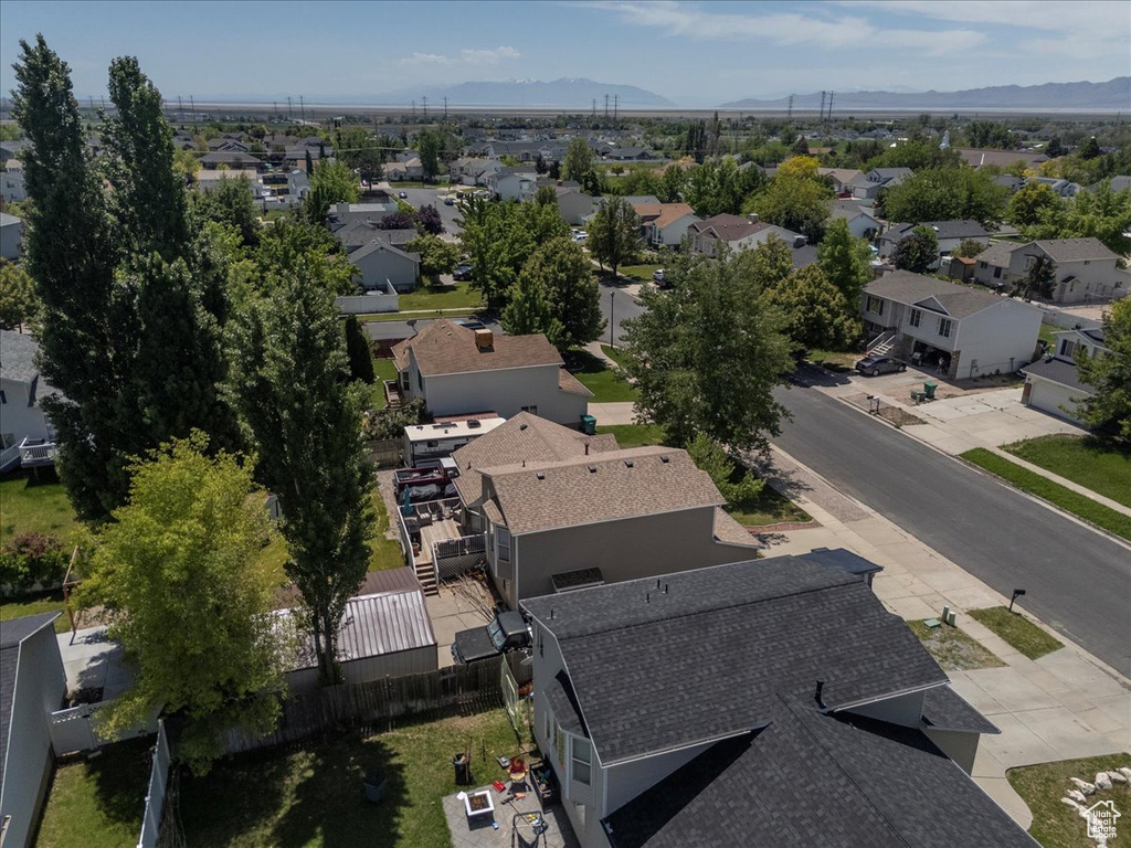 Aerial view of property\\\'s location featuring nearby suburban area and mountains