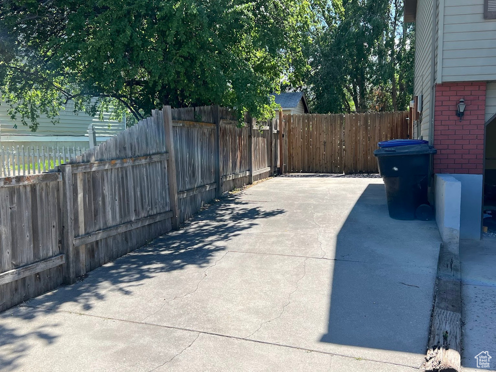 Fenced backyard featuring a patio area