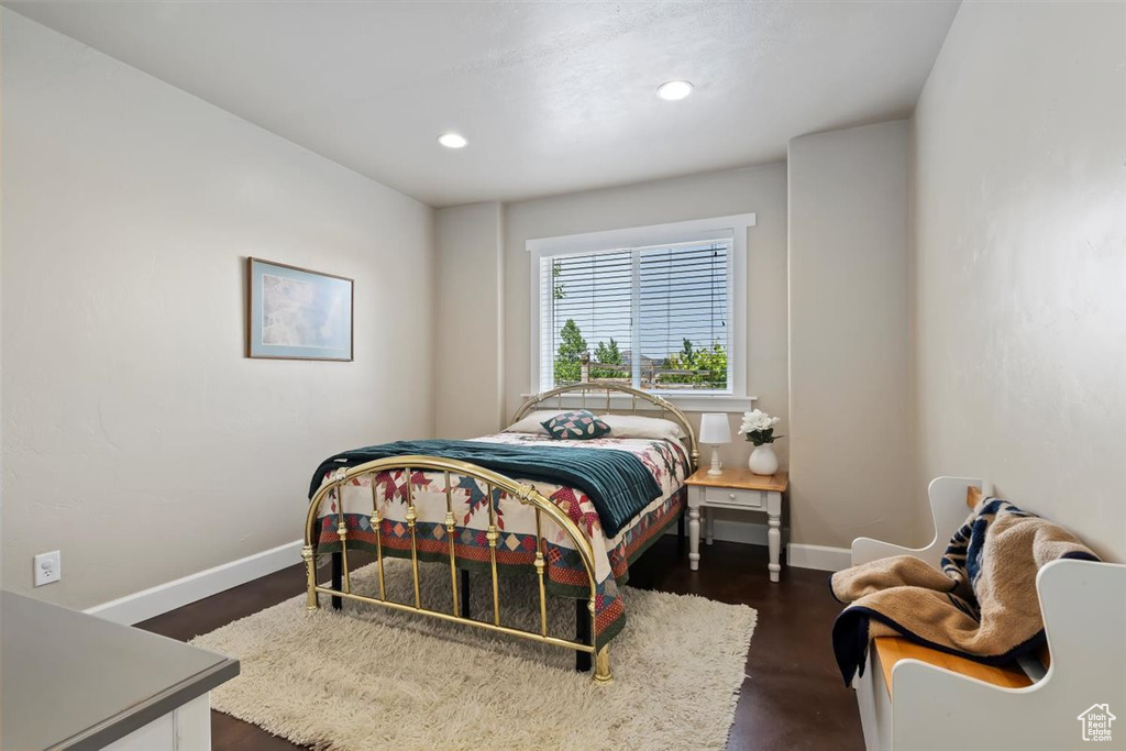 Bedroom featuring baseboards and recessed lighting