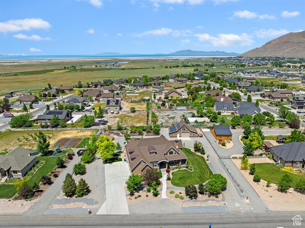 Aerial view of residential area featuring mountains