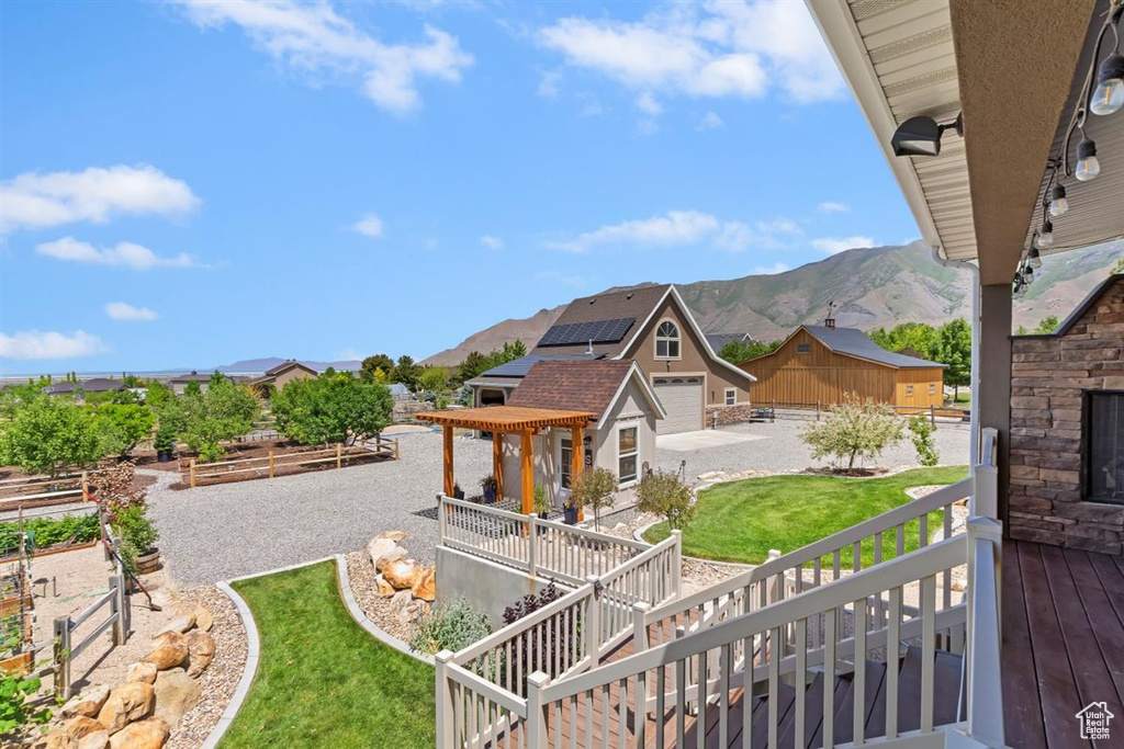 View of green lawn with a mountain view
