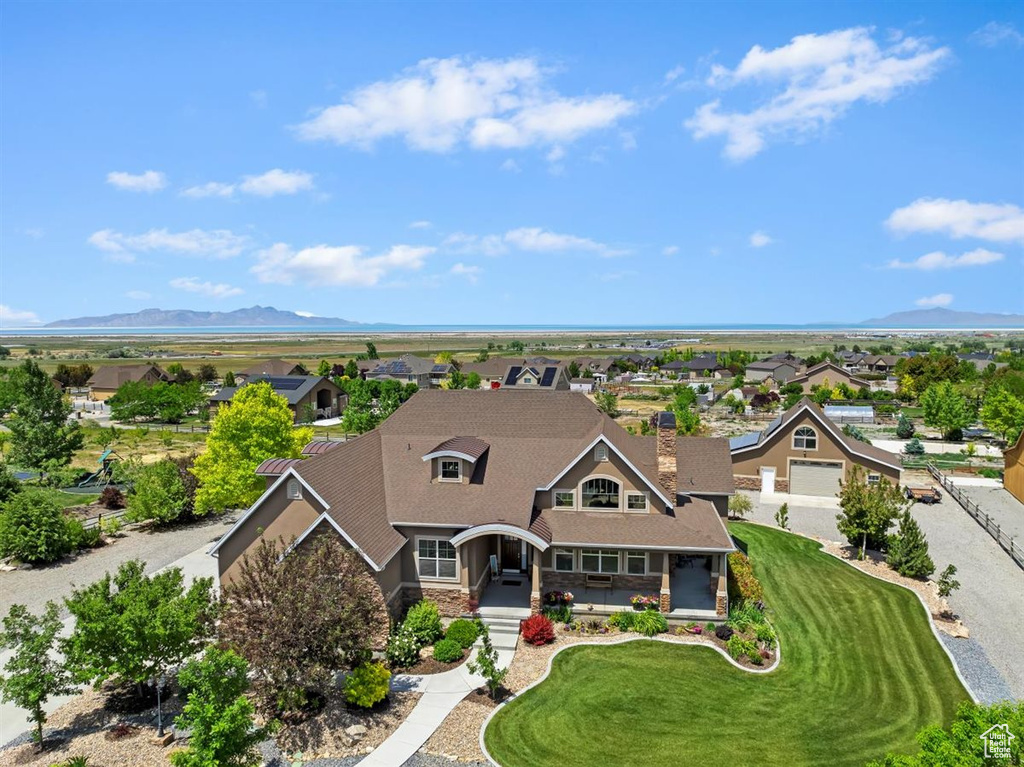 Aerial view of residential area with a mountain backdrop