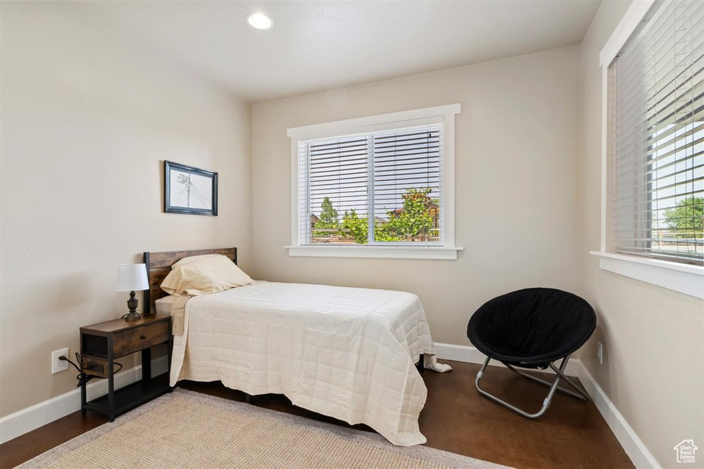 Bedroom with baseboards and recessed lighting