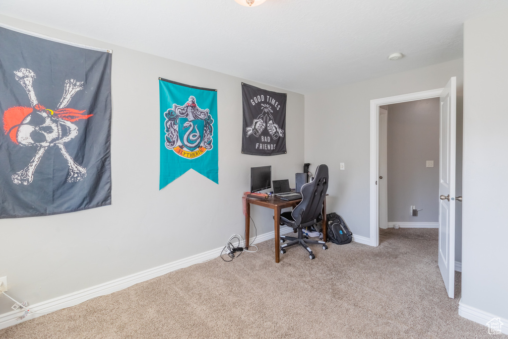 Office area with carpet floors and baseboards