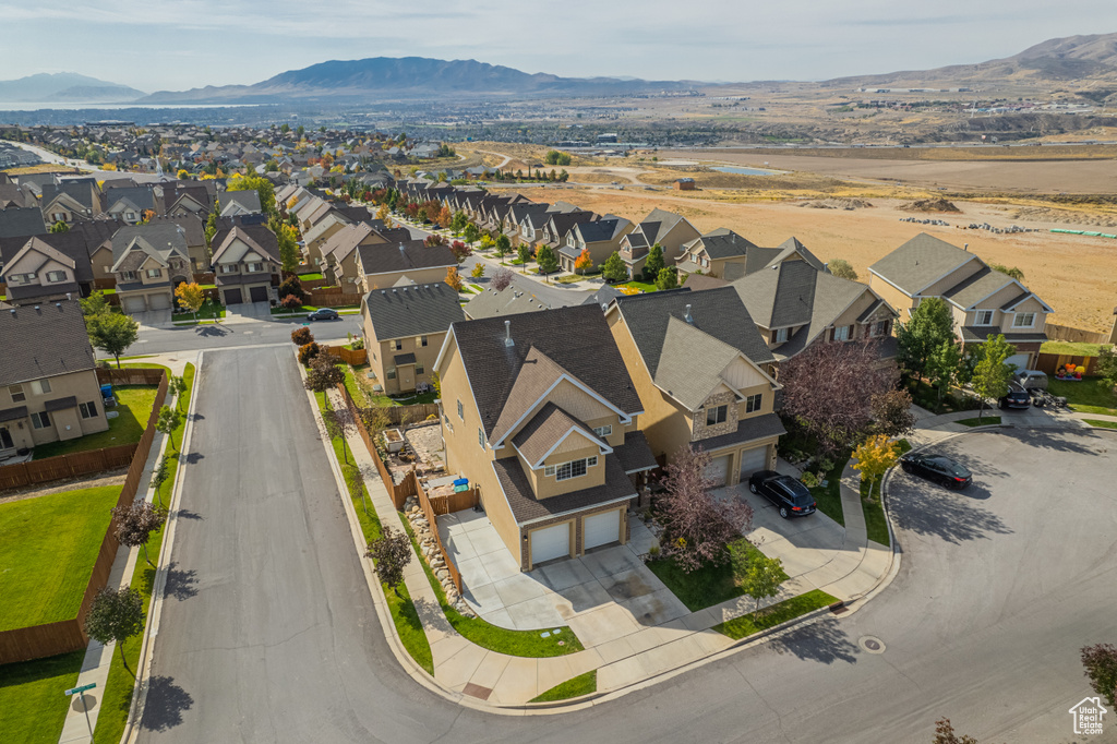 Aerial view of residential area with a mountain backdrop