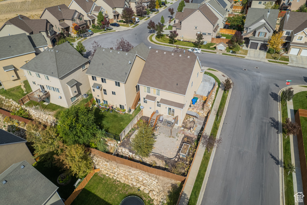 Aerial overview of property's location featuring nearby suburban area