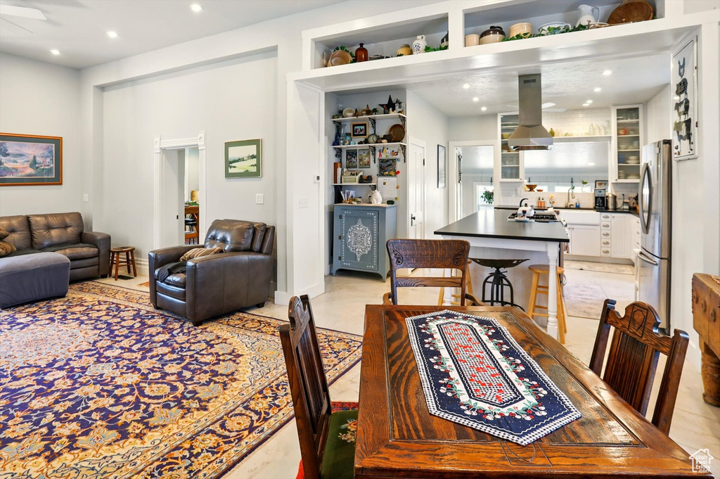 Dining space featuring recessed lighting and ceiling fan