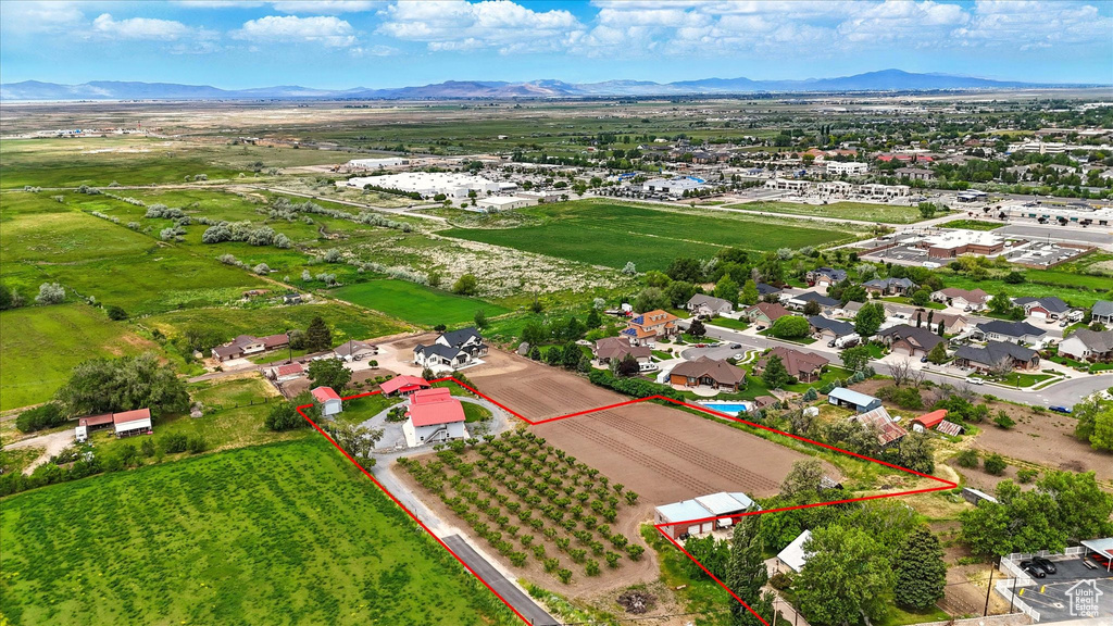 View of rural area with a mountainous background and property parcel outlined