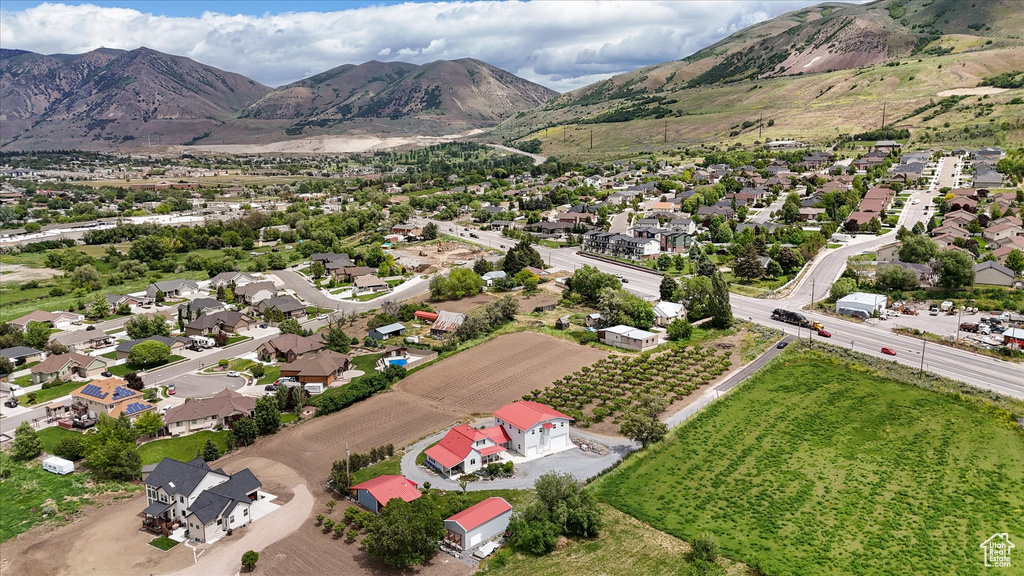 Aerial view of residential area with a mountainous background