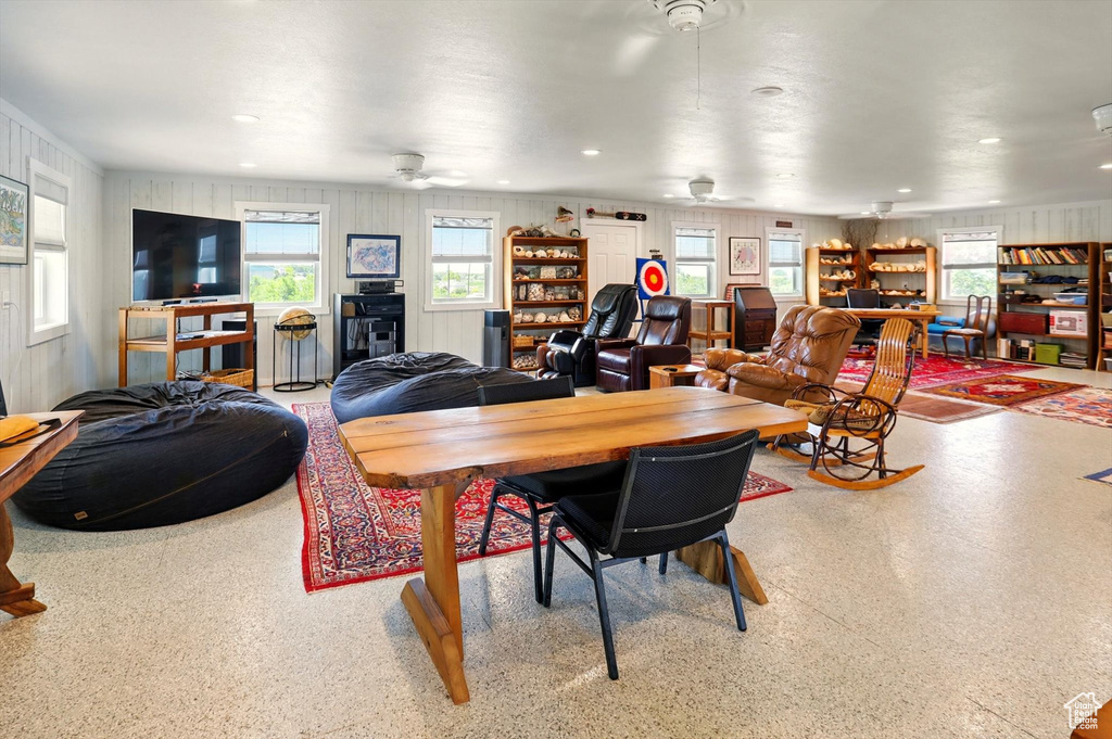 Dining space featuring a ceiling fan and recessed lighting