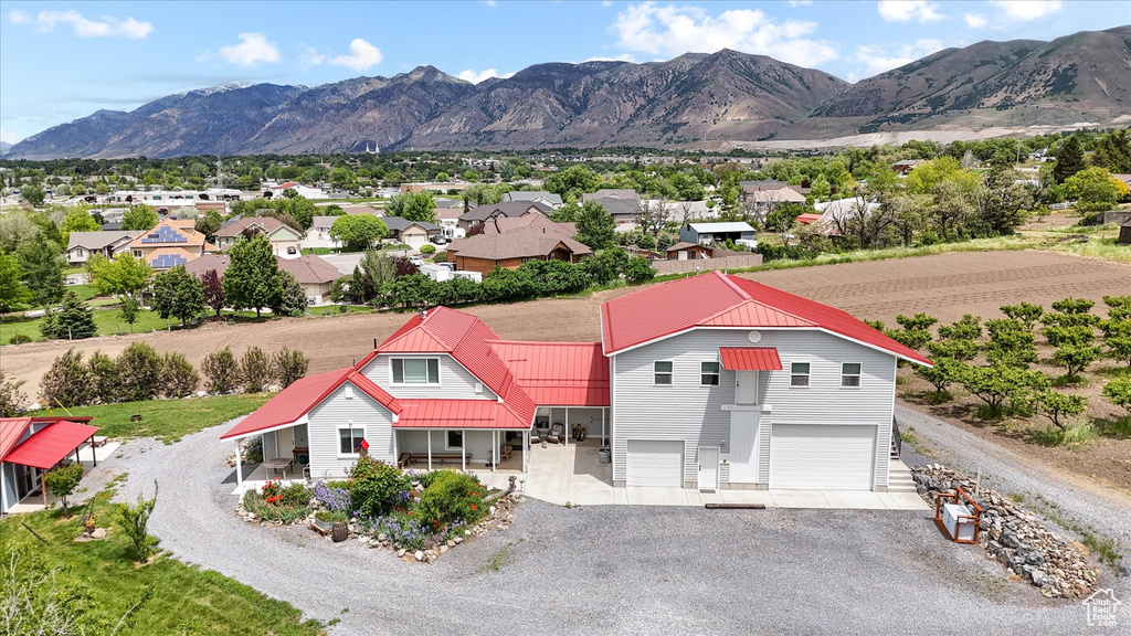 View of mountain backdrop with nearby suburban area