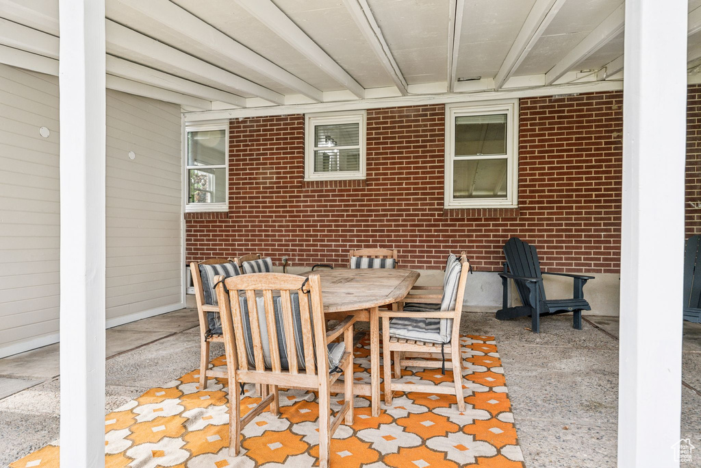 View of patio featuring outdoor dining area