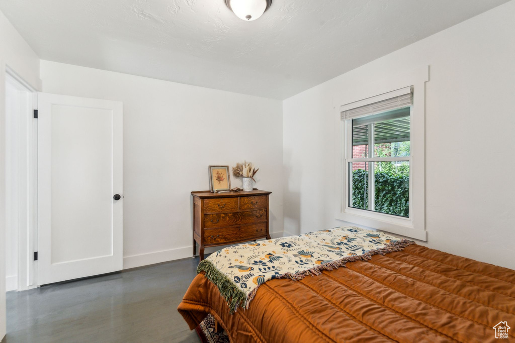 Bedroom featuring baseboards
