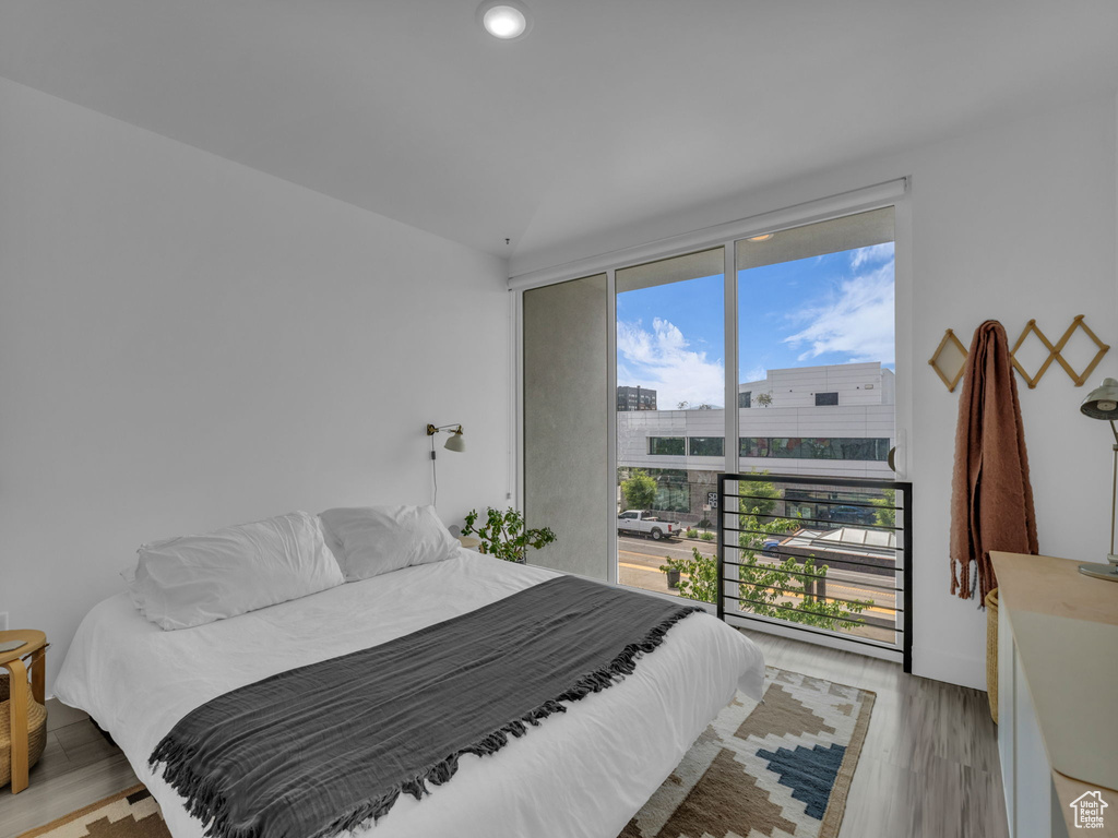 Bedroom featuring light wood-style floors and recessed lighting