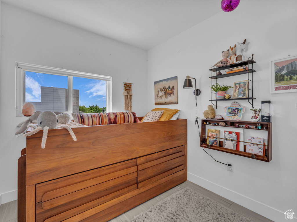 Dining room with baseboards and wood finished floors