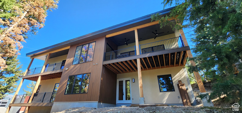 Rear view of house with a balcony