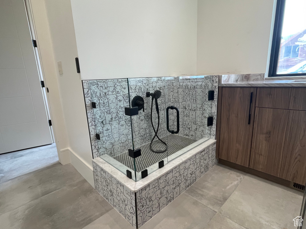 Bathroom featuring concrete floors