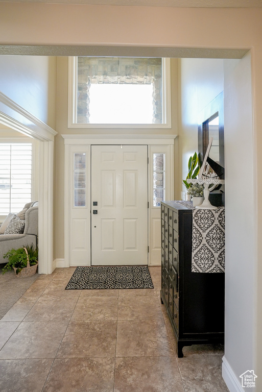 Entrance foyer featuring healthy amount of natural light