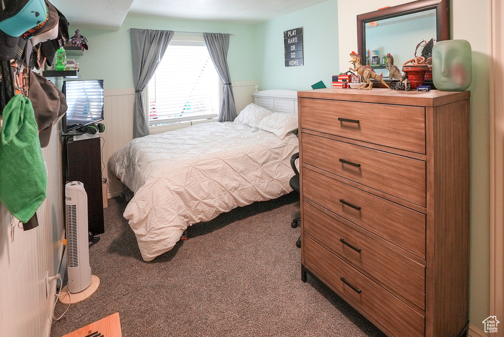 Bedroom with carpet flooring