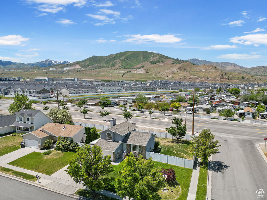 View of mountain backdrop with nearby suburban area