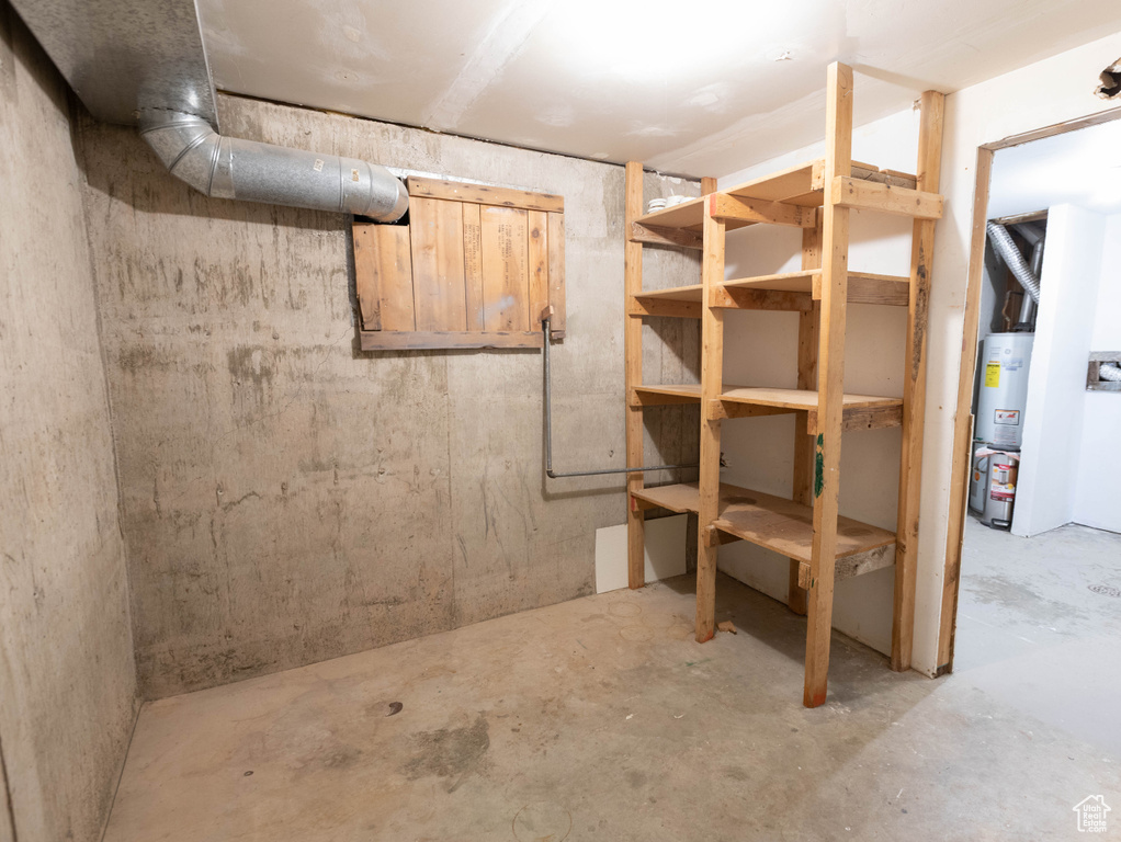 Unfinished basement with water heater