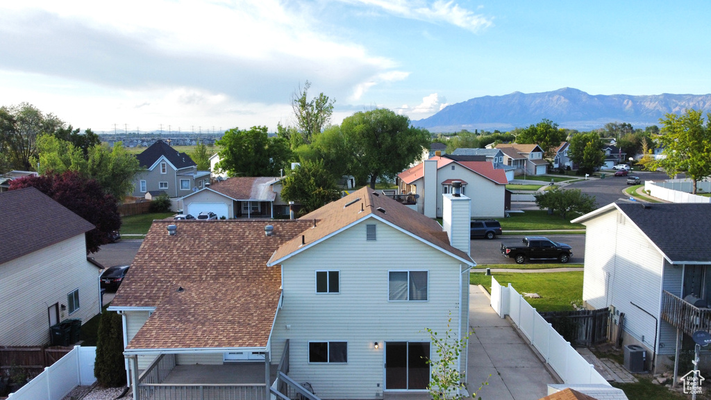 Aerial view of residential area with mountains