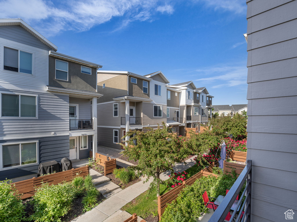 Balcony featuring a residential view